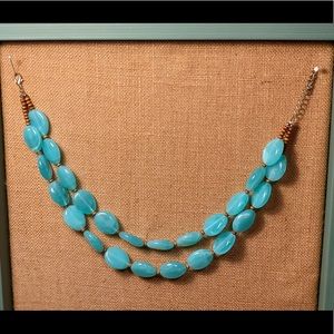 Turquoise colored beaded necklace